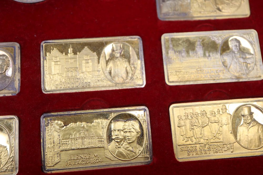 A cased set of twelve silver gilt The Churchill Years ingots and a similar medallion, gross 21.5oz.